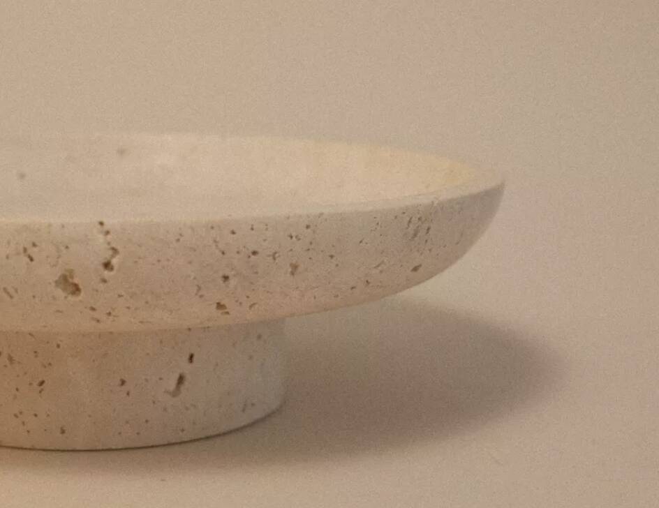 Travertine pocket emptier