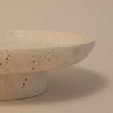 Travertine pocket emptier