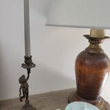 Pewter gray cherub candle holder.