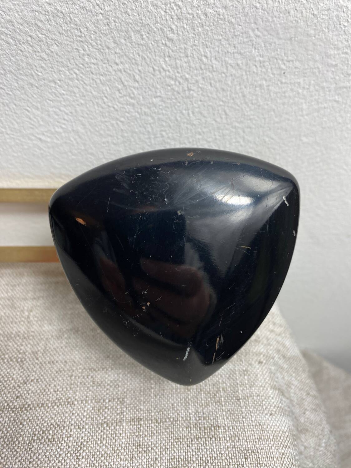 Wall-mounted coat rack with 3 hooks from the 1960s.