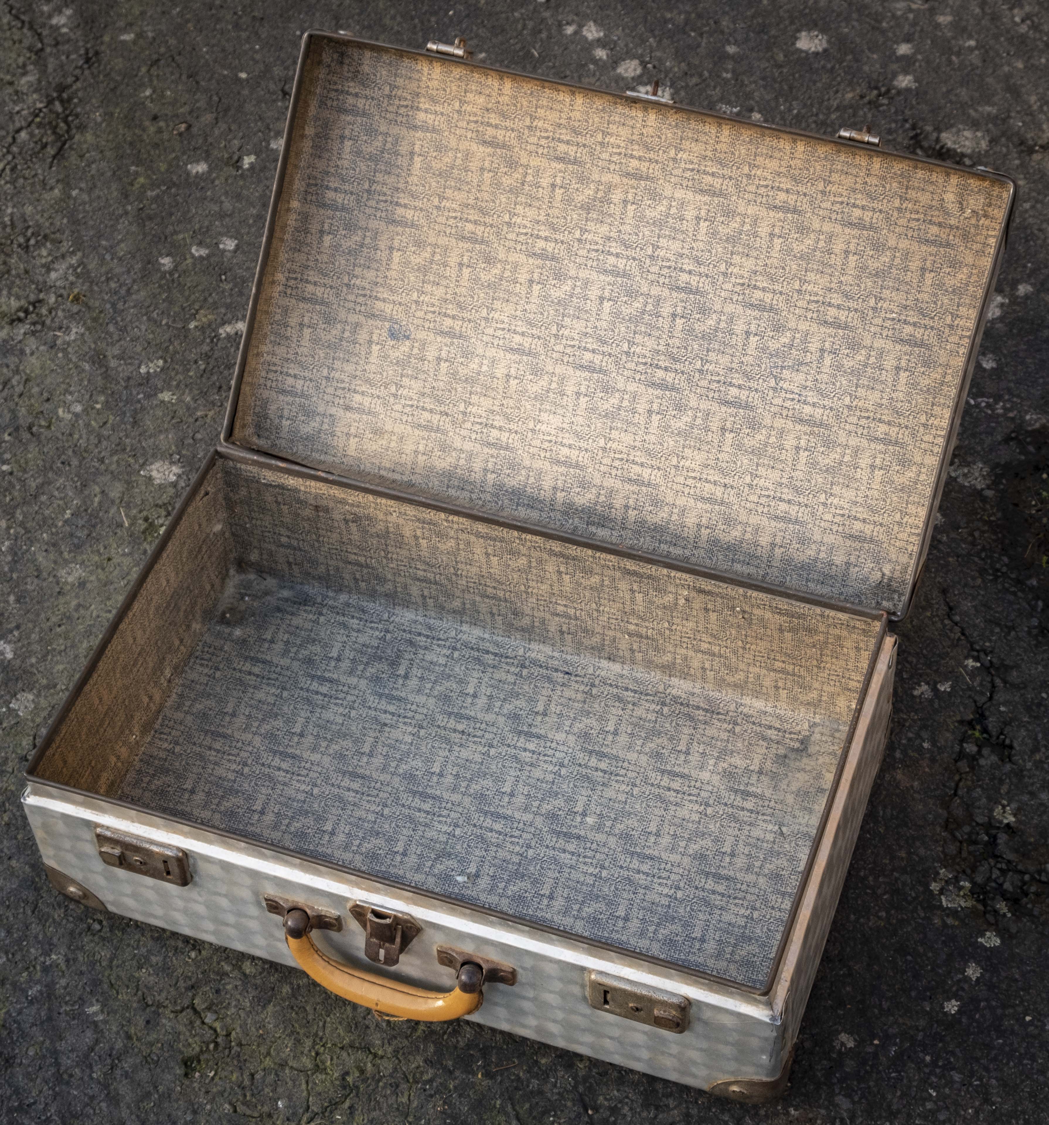 Metallic suitcase