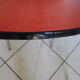 Table in red formica, 4 roc chairs, 2 extension cords, 2 drawers 60