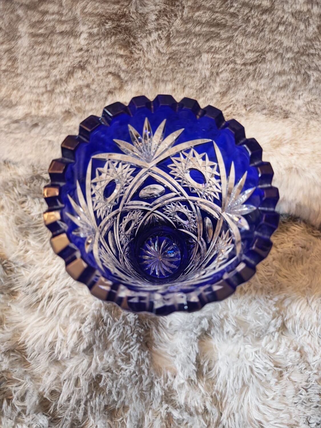 Bohemian vase in cut crystal with blue overlay.