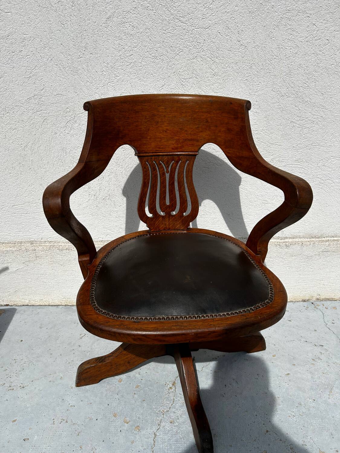 Milwaukee Chair Co. swivel office chair – leather and wood – circa