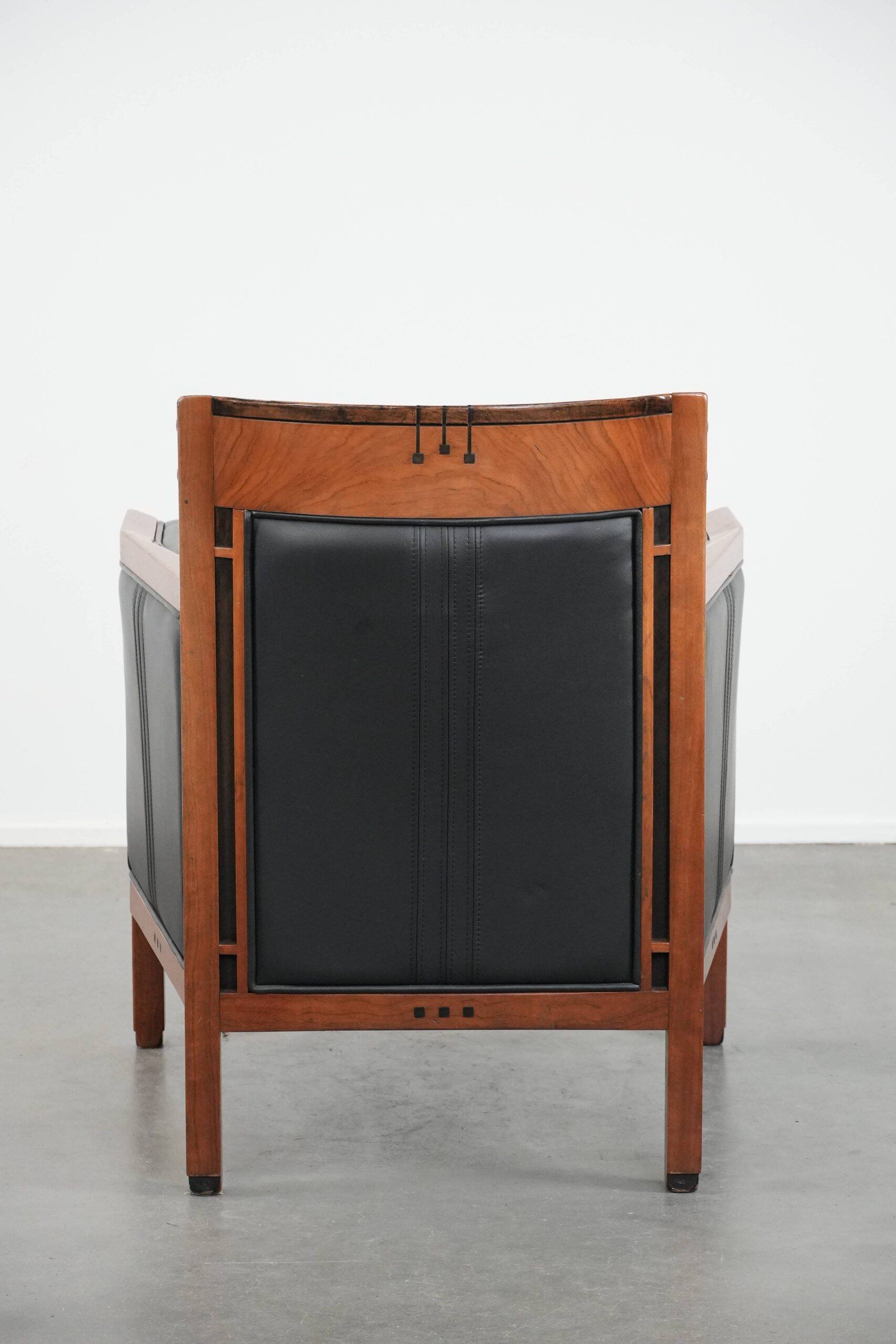 Fauteuil Art Déco en cuir noir et bois