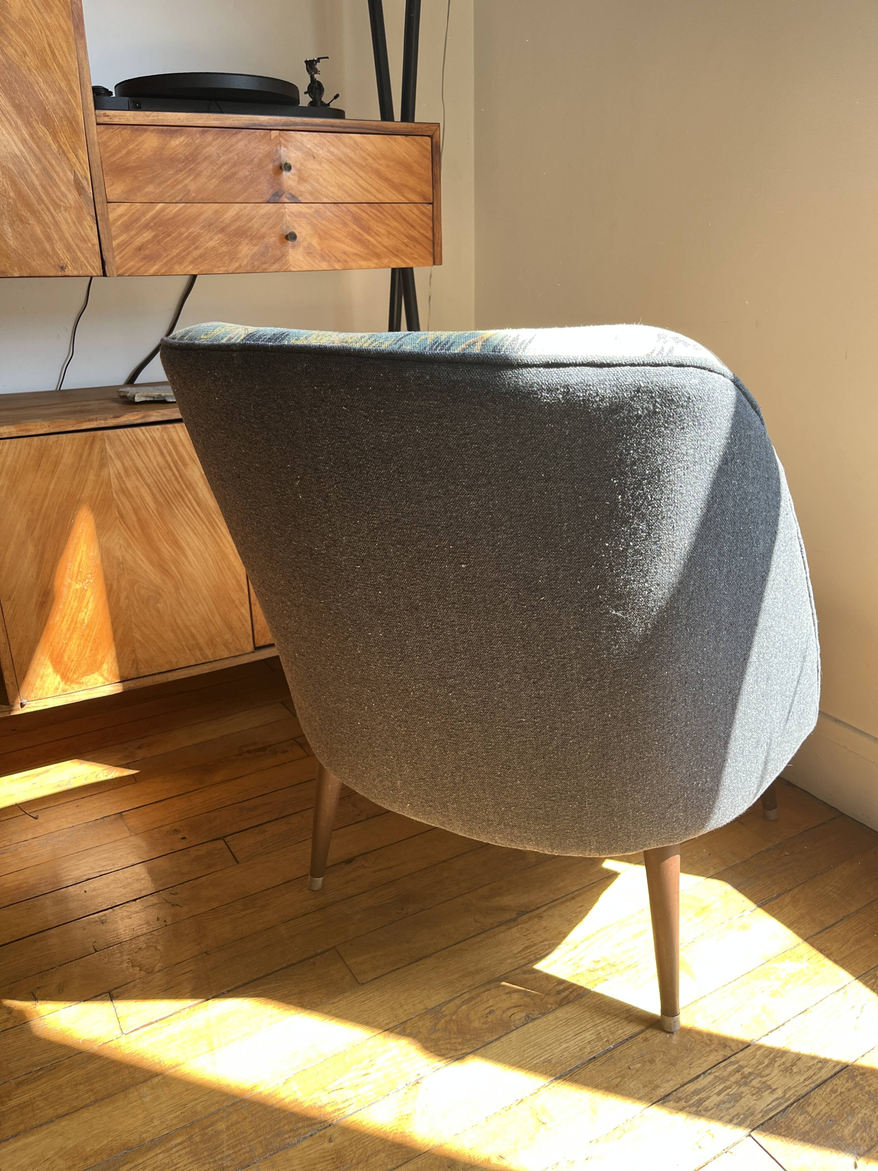 J. Tenreiro, Brazil. Concha armchair with tapered legs, Cluny tapestry 1400.