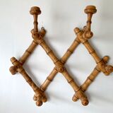 Wall-mounted accordion coat rack