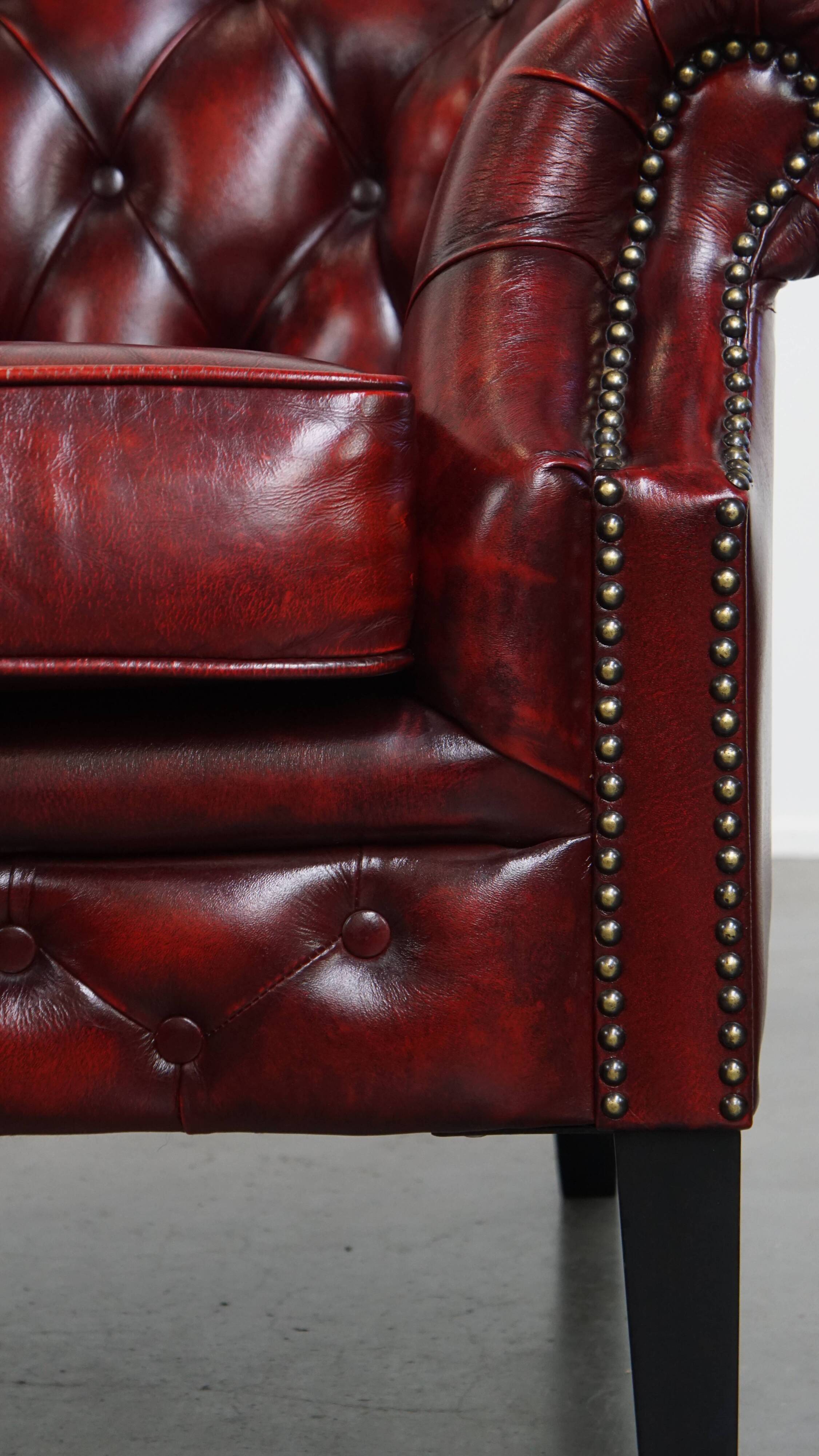 Set of a Red Cowhide Leather Chesterfield Club Chair and Side Table