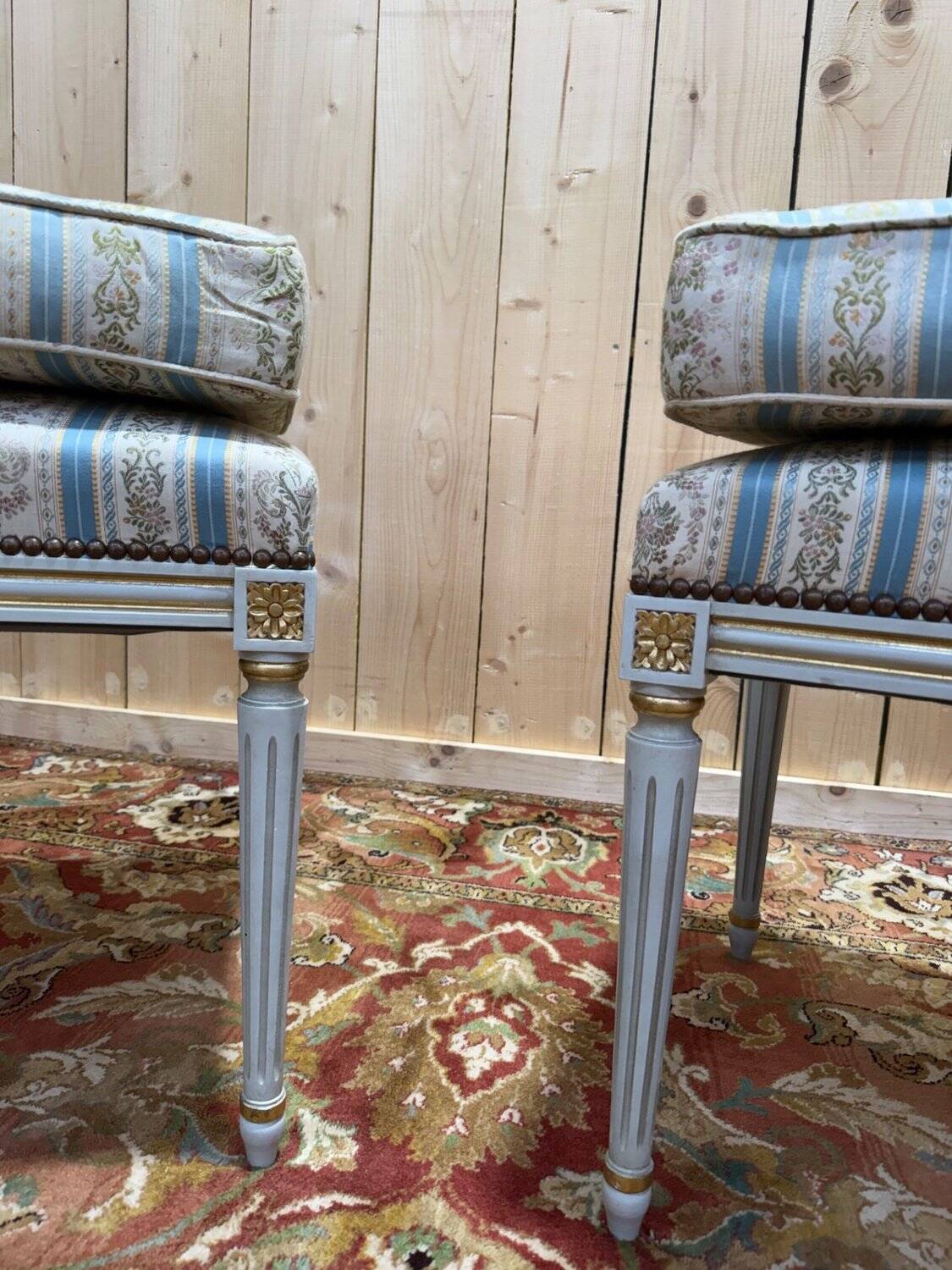 Pair of Louis XVI benches in lacquered and gilded wood