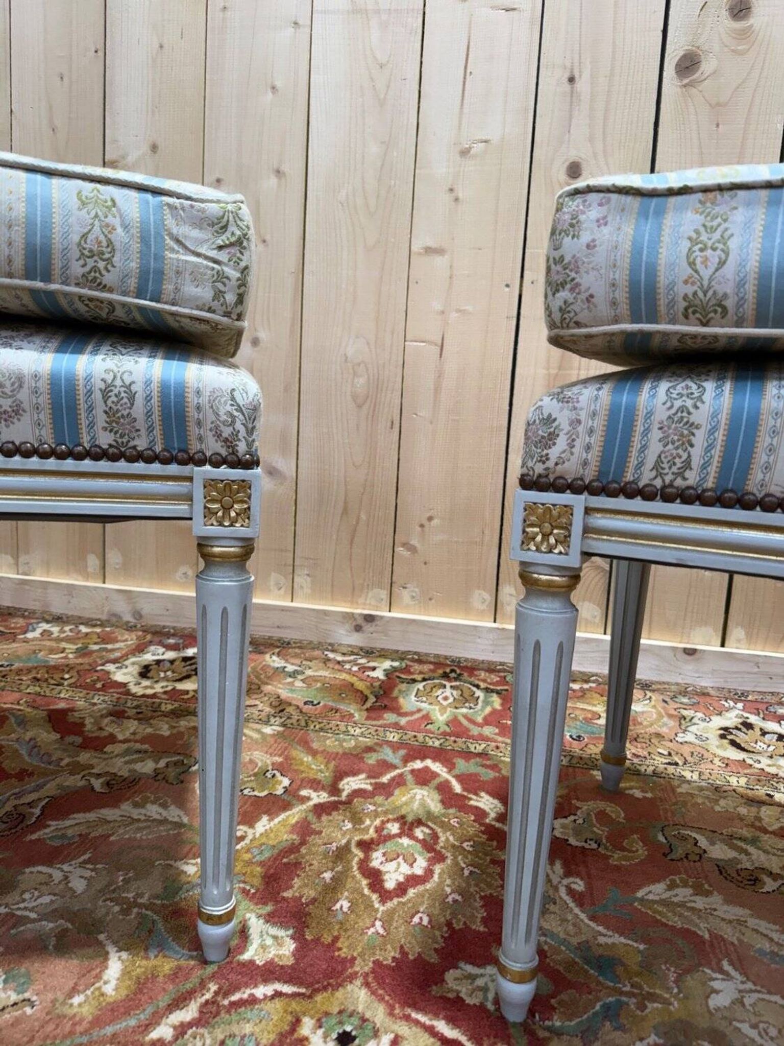 Pair of Louis XVI benches in lacquered and gilded wood