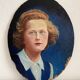 Old oil painting on oval wood with roses thrown from the 30s