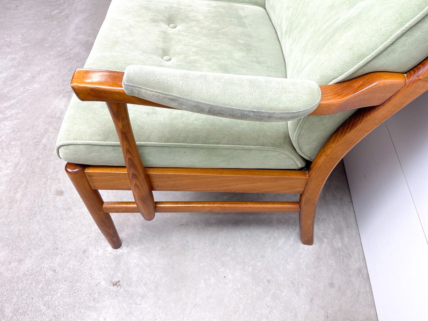 Two-seater sofa from the sixties with green upholstery