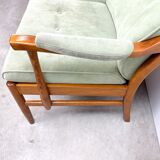 Two-seater sofa from the sixties with green upholstery