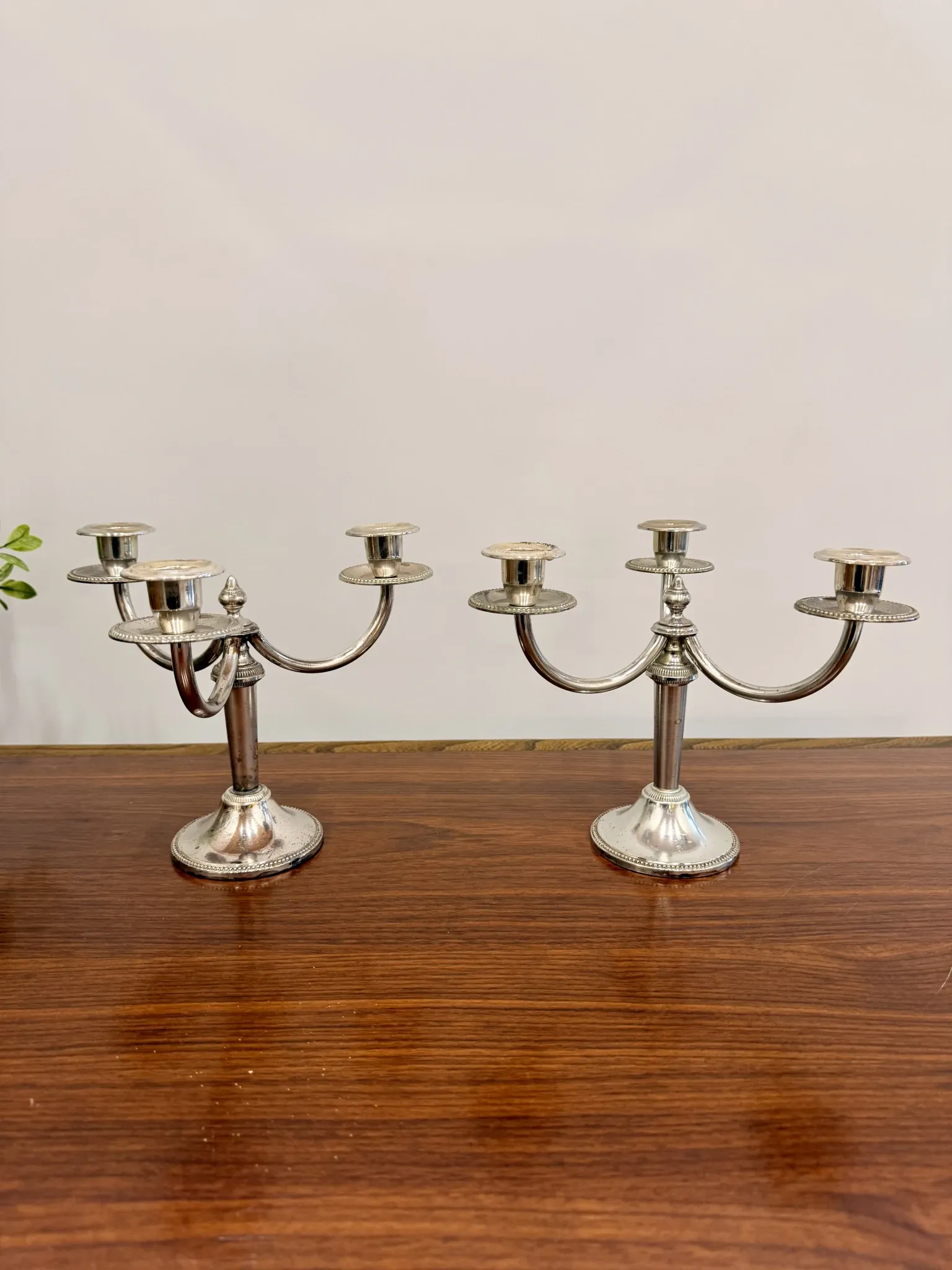 Pair of vintage three-branch silver-plated candlesticks