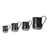 Set of 4 vintage bar measures in brushed stainless steel from the 60s-70s.