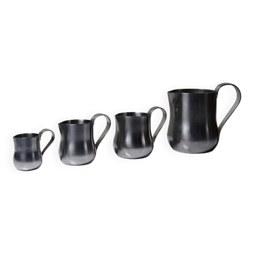 Set of 4 vintage bar measures in brushed stainless steel from the 60s-70s.