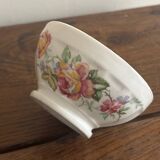 Vintage small antique bowl with floral decoration.