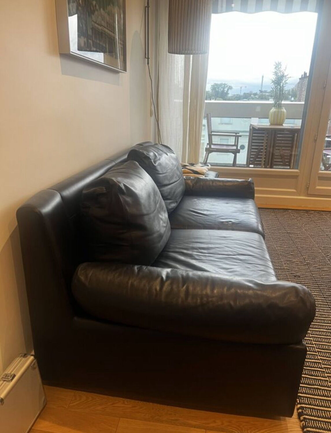 Vintage black leather 2-seater sofa from the 70s by Edelhard Harlis – 180 cm