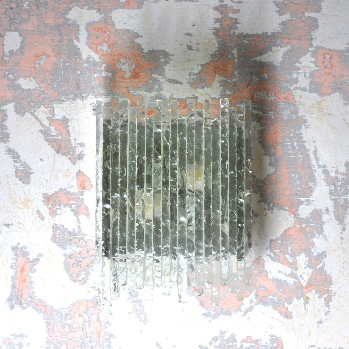 Vesta wall light in striped raw crystal with satin stainless steel support by Albano Poli for Poliarte.