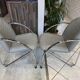 Pair of Souvignet armchairs, grey leather, chrome, 1980.