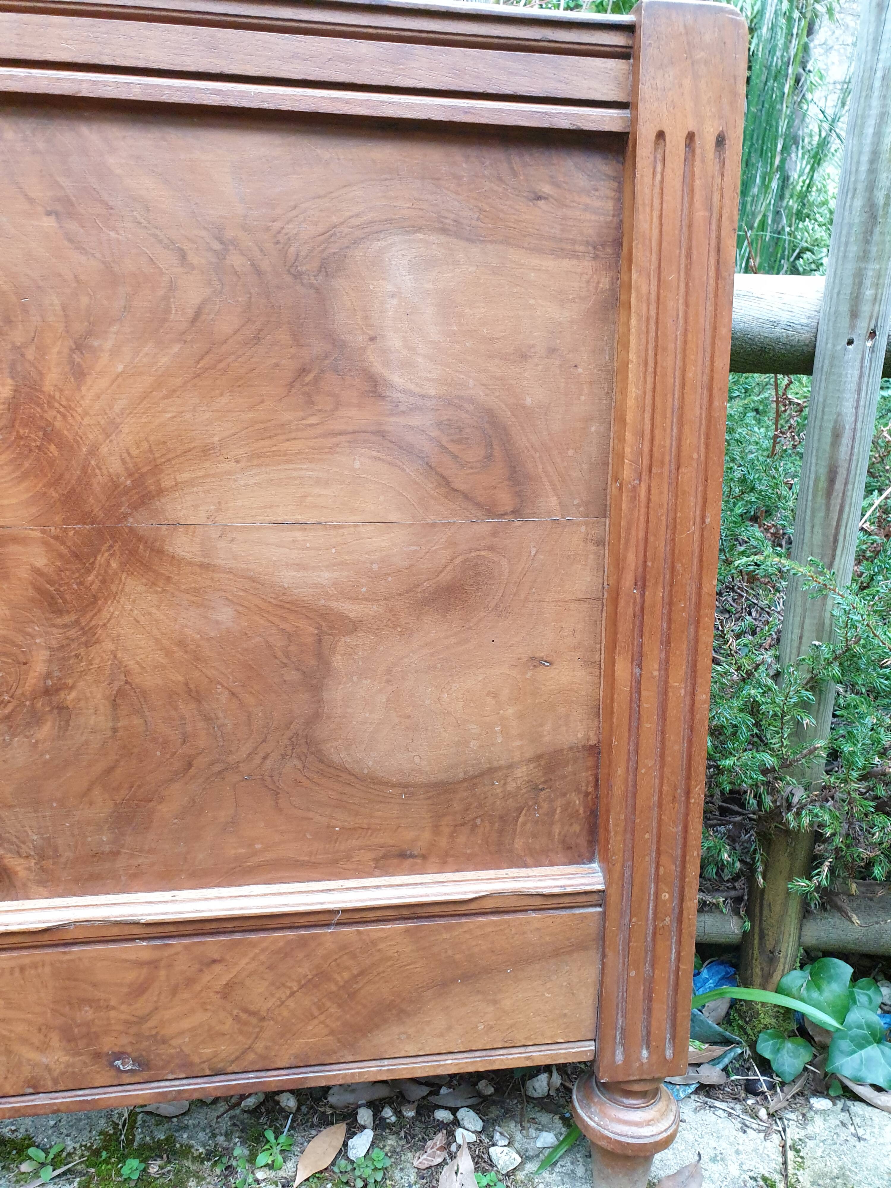 Carved walnut headboard