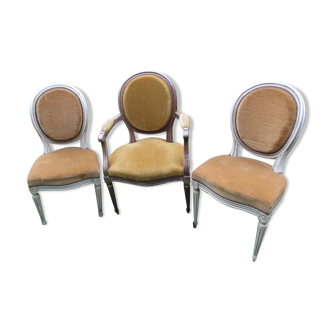2 chairs and an armchair chair