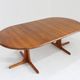 Table à manger ronde extensible vintage en teck massif des années 1960.