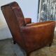 Old studded leather club chair 1930-1930