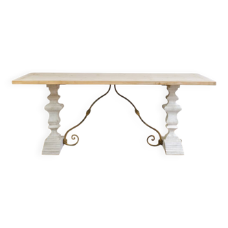 Industrial table with sandblasted top and bleached legs.