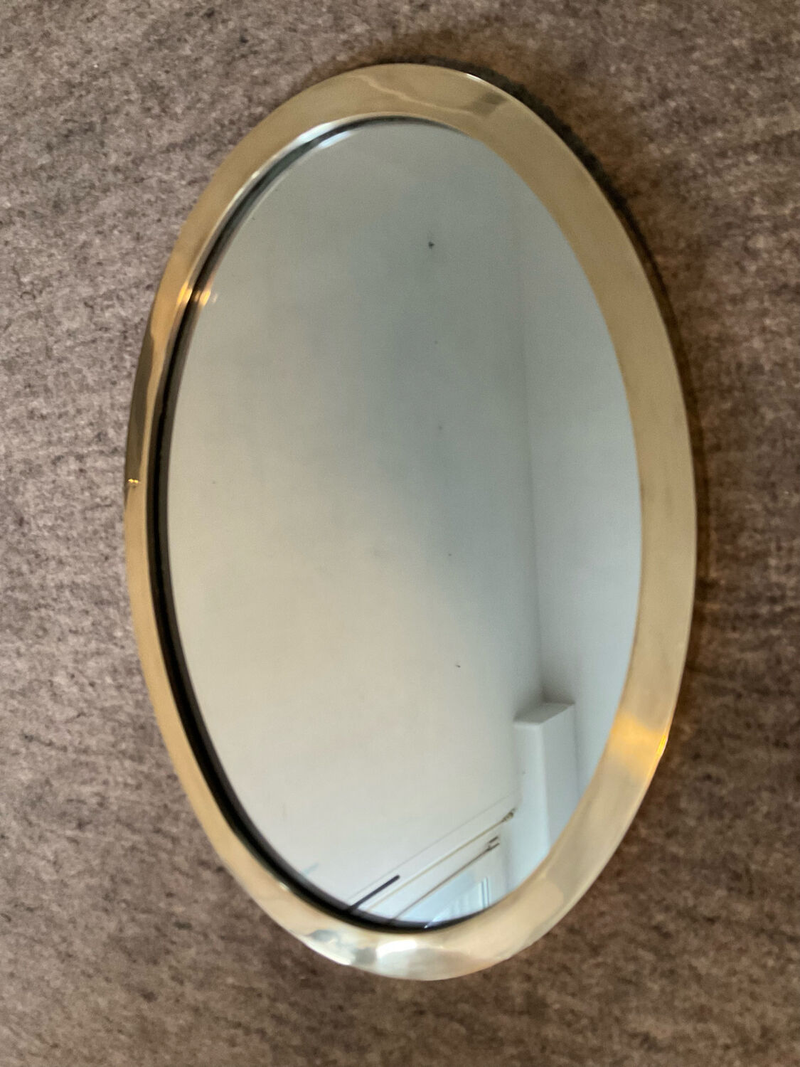Vintage oval mirror in solid brass