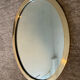 Vintage oval mirror in solid brass