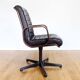 Stoll Giroflex conference chair in leather and 1960s wood