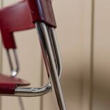 Red plastic-seat stacking chair with chrome frame by Paolo Favaretto for Assisa (Italy 1986) – vintage design