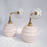 Swan neck and glass globe wall lights