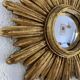 Vintage 1960s sunburst witch's eye mirror in gold - 27 cm