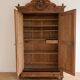 Antique solid wood wardrobe with mirror doors.