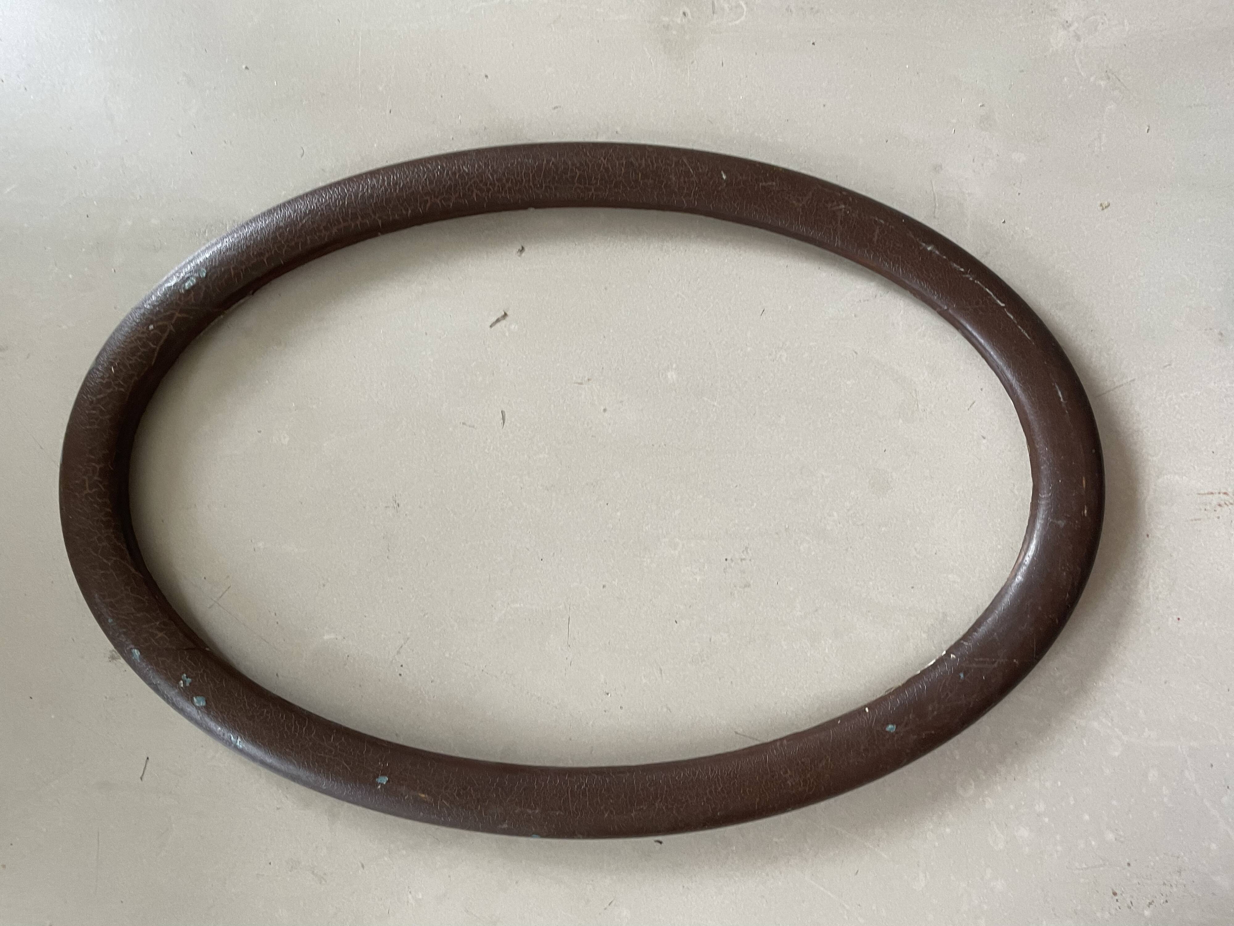 Oval old wooden frame