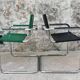 Pair of armchairs, tubular structures and imitation leather