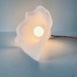 Flower suspension in glass paste