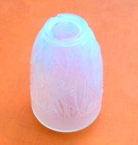 Opalescent glass vase in the shape of an urn Decoration of foliage and berries