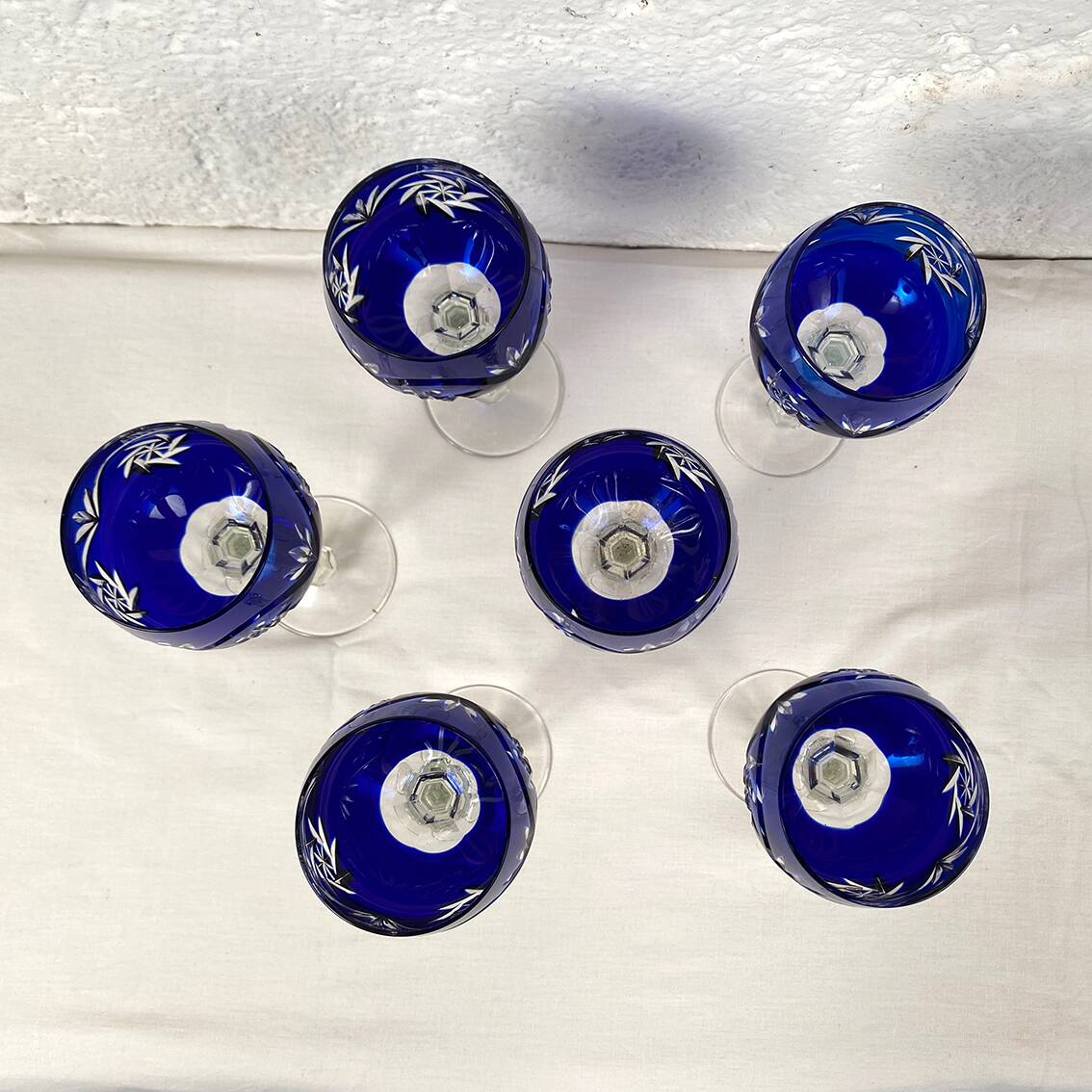 Bohemia. Series of six cut crystal wine glasses from the Rhine in blue.