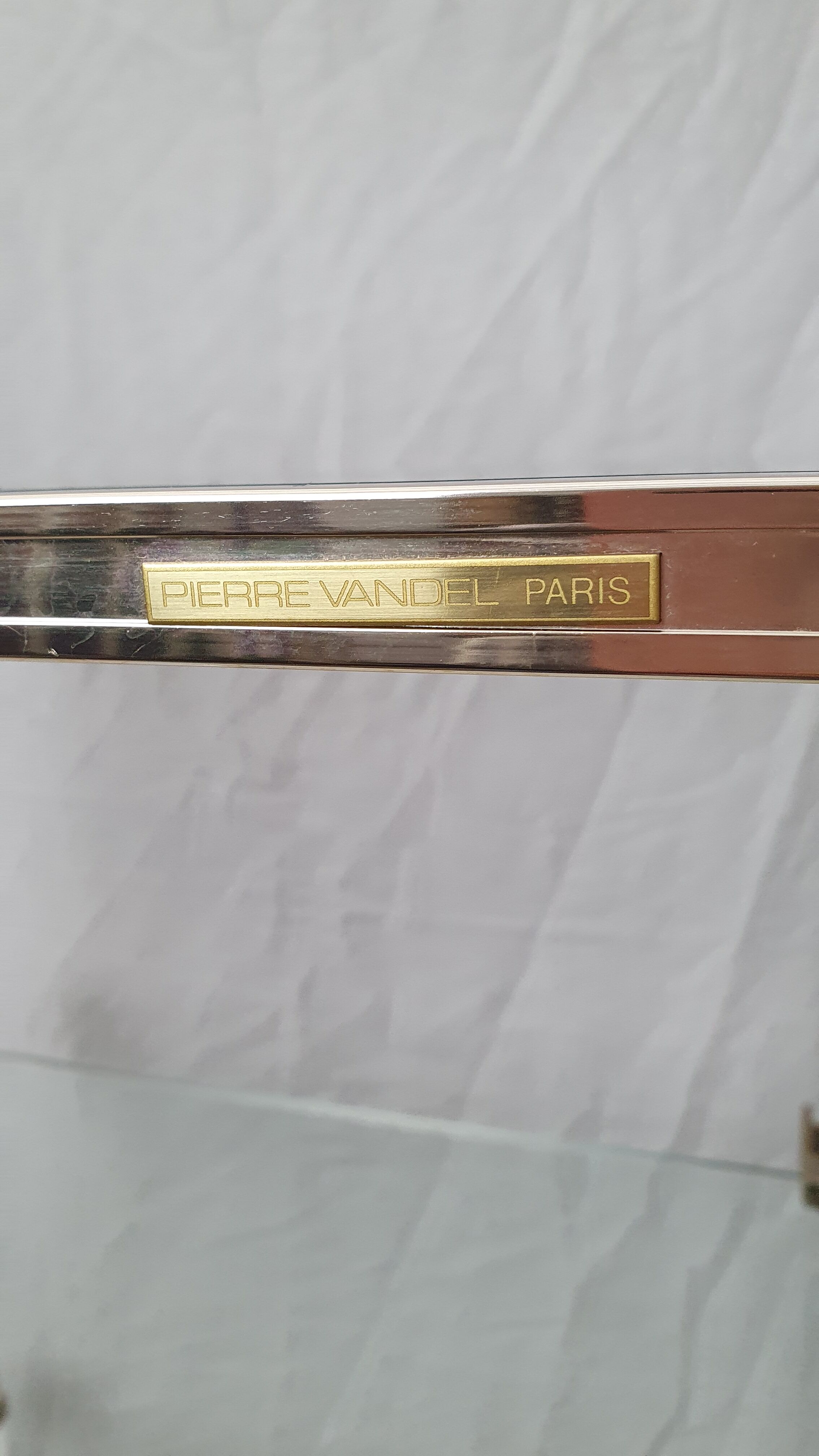 Rolling glass and plexiglass shelf by Pierre Vandel