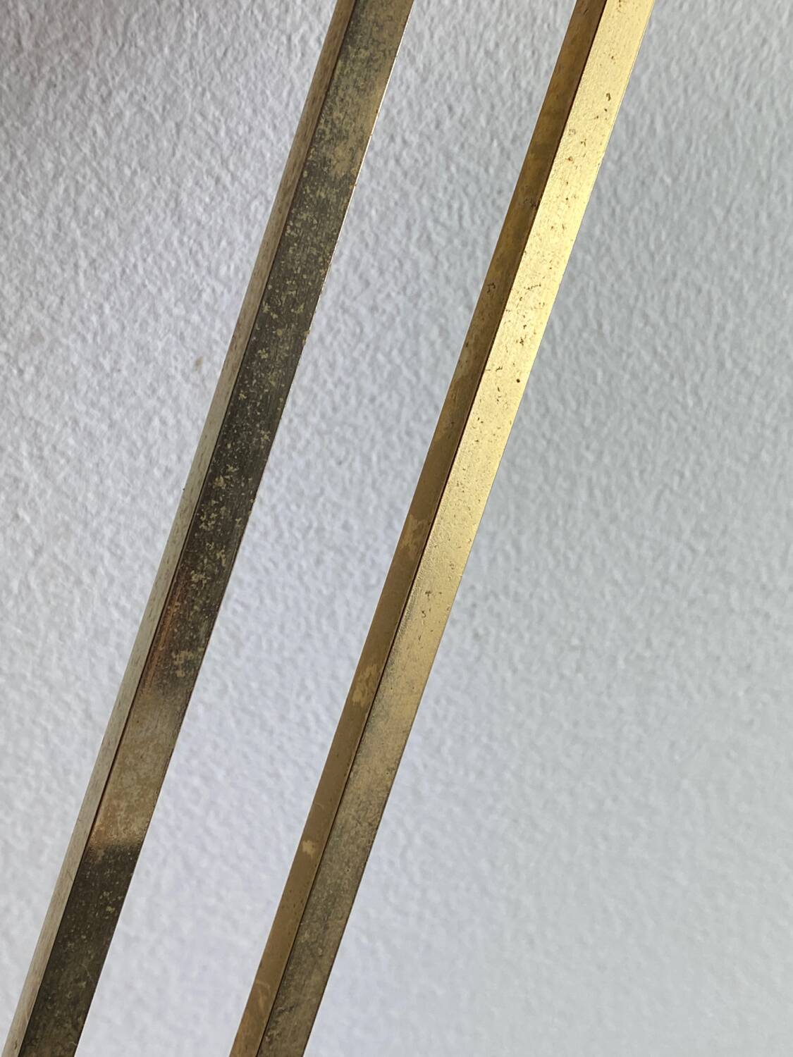 Wall-mounted coat rack with 3 hooks from the 1960s.