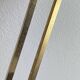 Wall-mounted coat rack with 3 hooks from the 1960s.