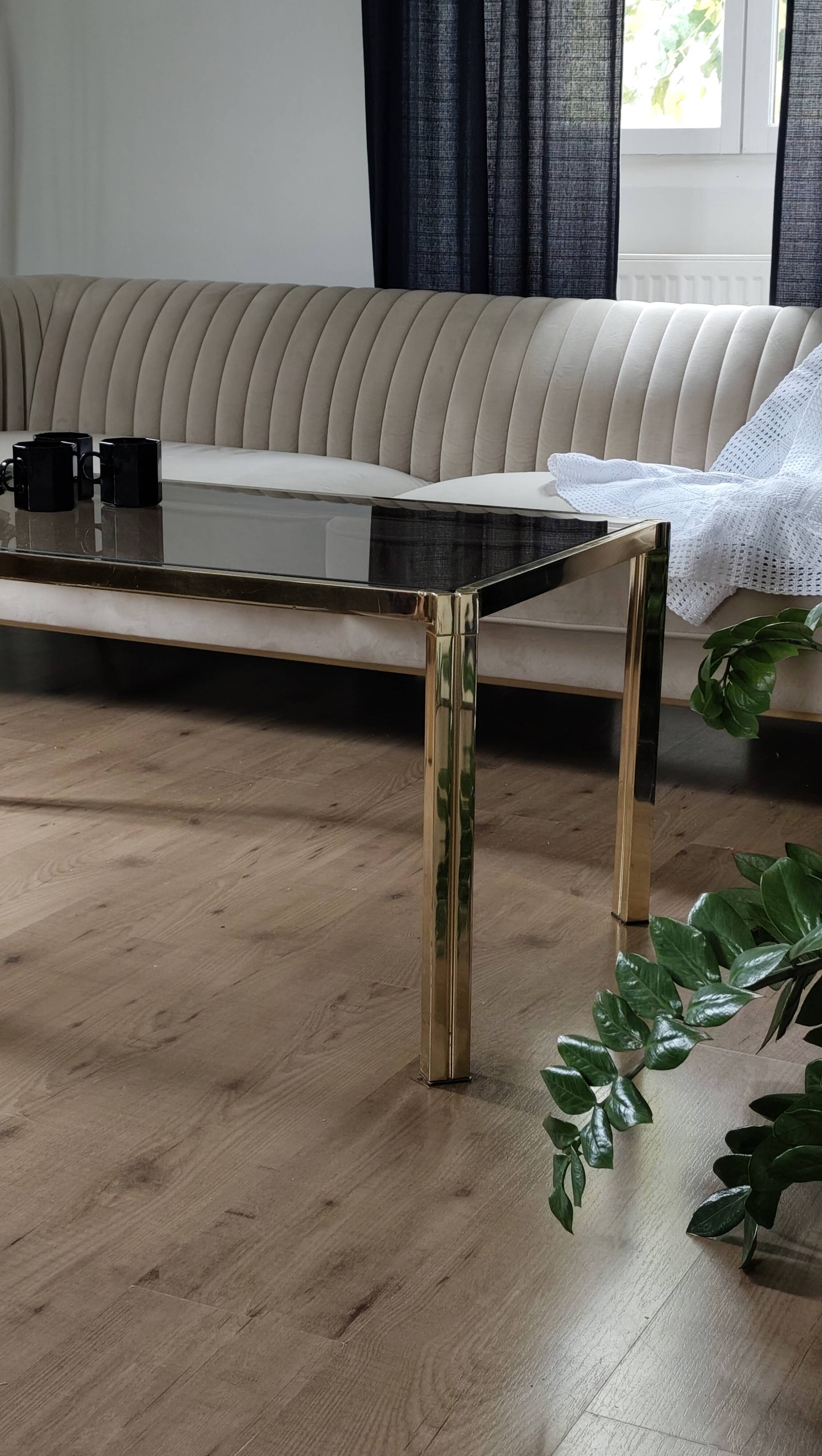 Brass coffee table with smoked glass top