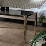 Table basse laiton plateau verre fumé