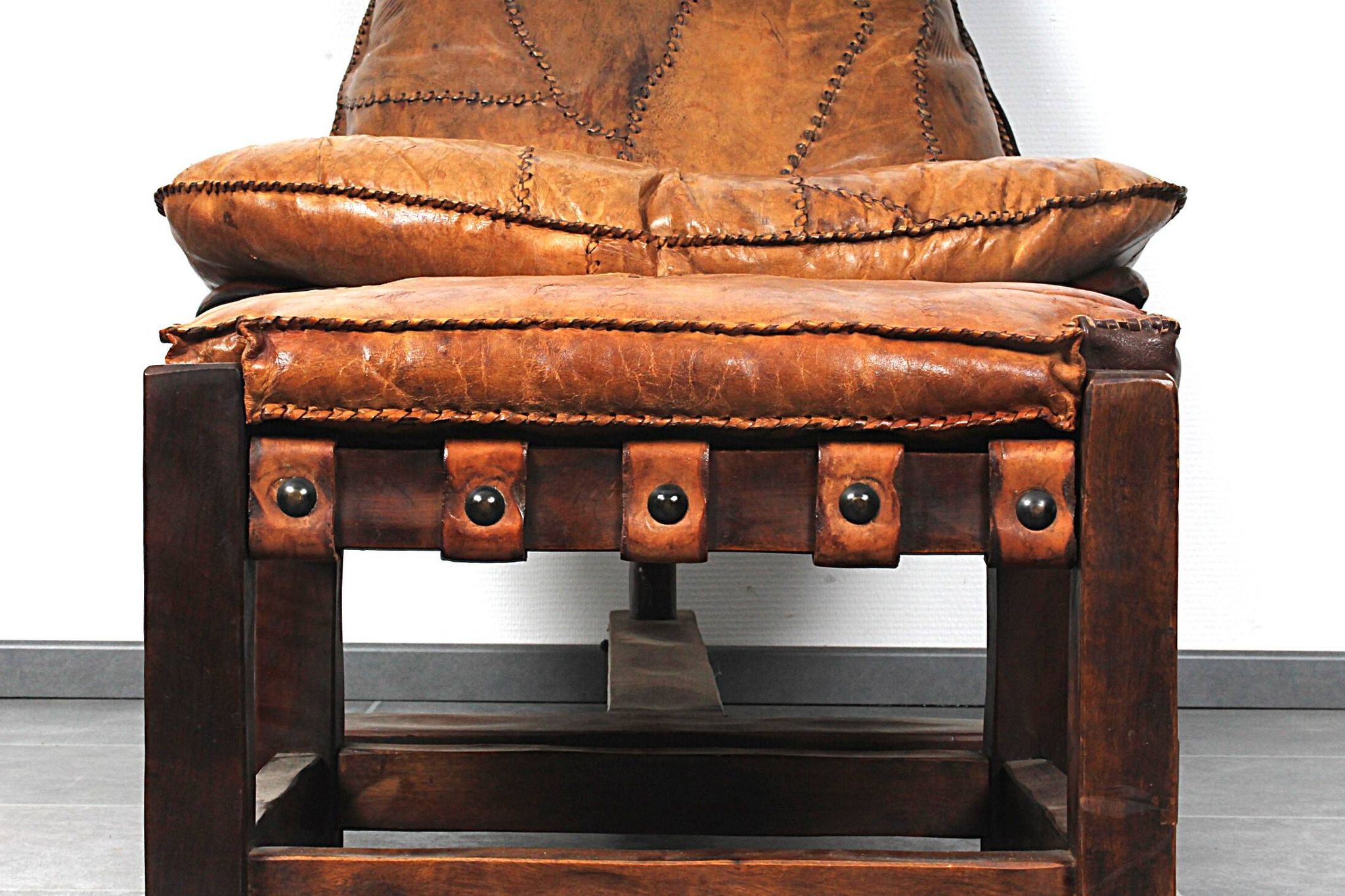 Brutalist oak lounge chair and ottoman, 1970s, set of 2