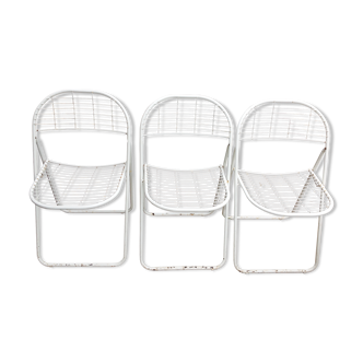 Trio of folding metal chairs