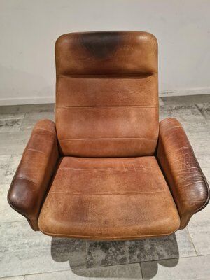Adjustable and swivel brown armchair by De Sede 50