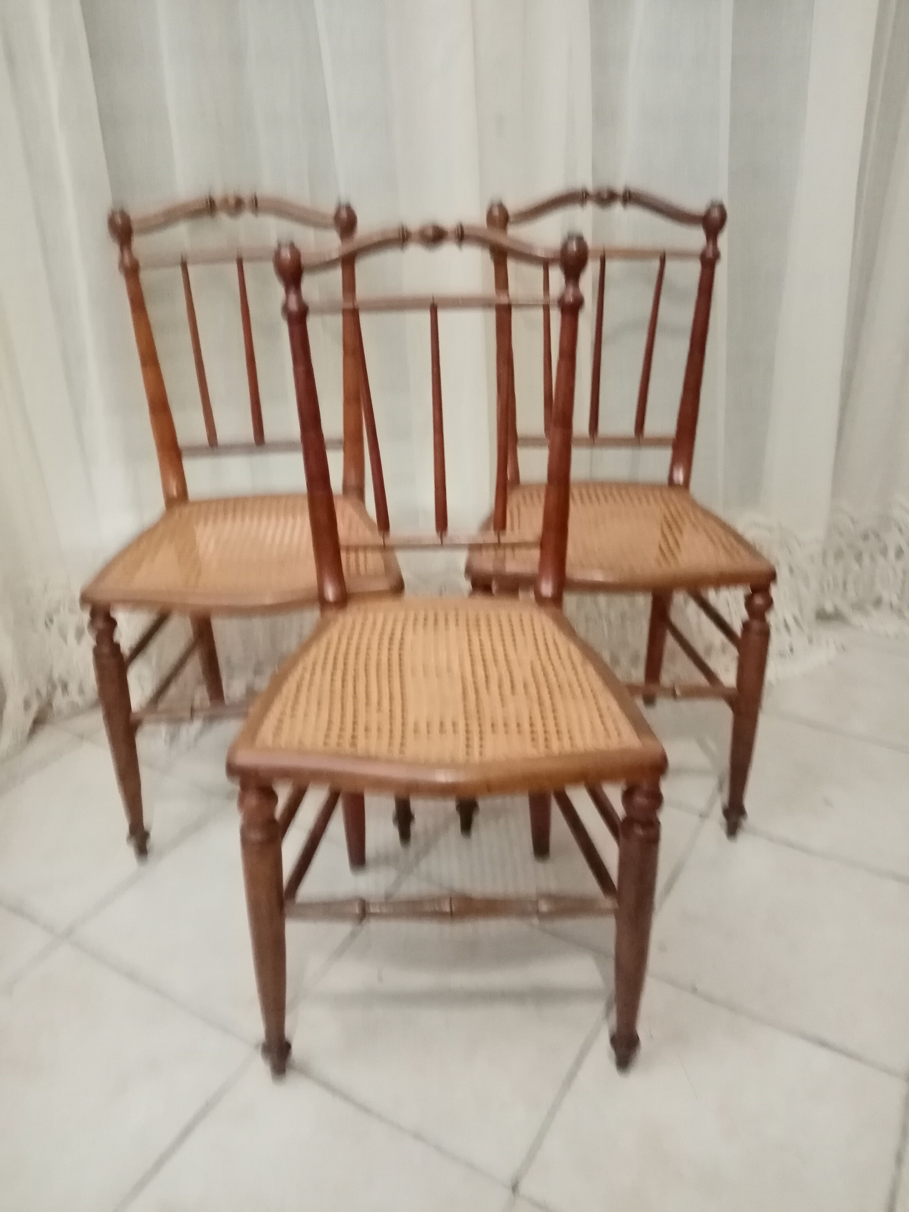 3 wooden and canning chairs